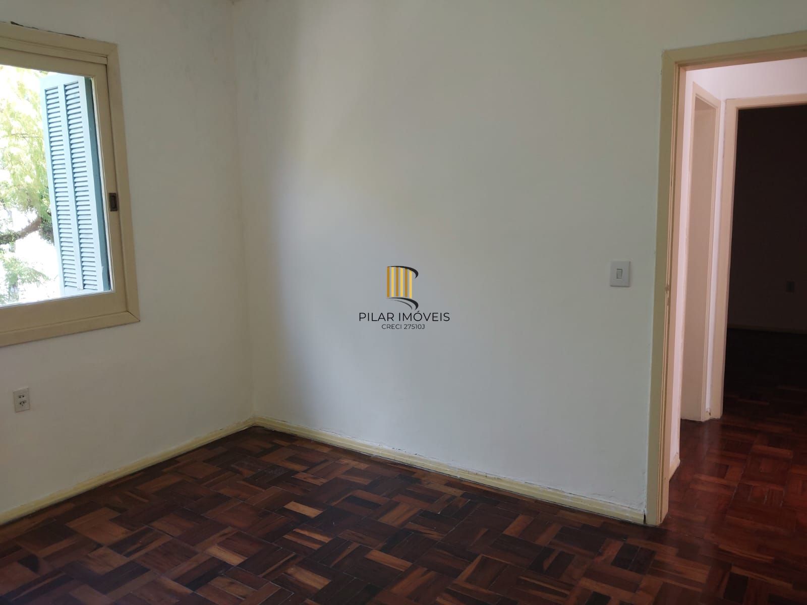 Apartamento de frente com 2 dormitórios para venda no bairro Jardim Botânico em Porto Alegre/RS.