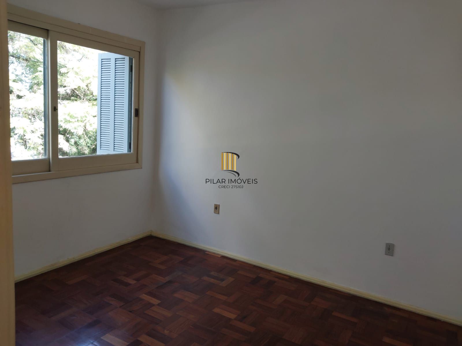 Apartamento de frente com 2 dormitórios para venda no bairro Jardim Botânico em Porto Alegre/RS.
