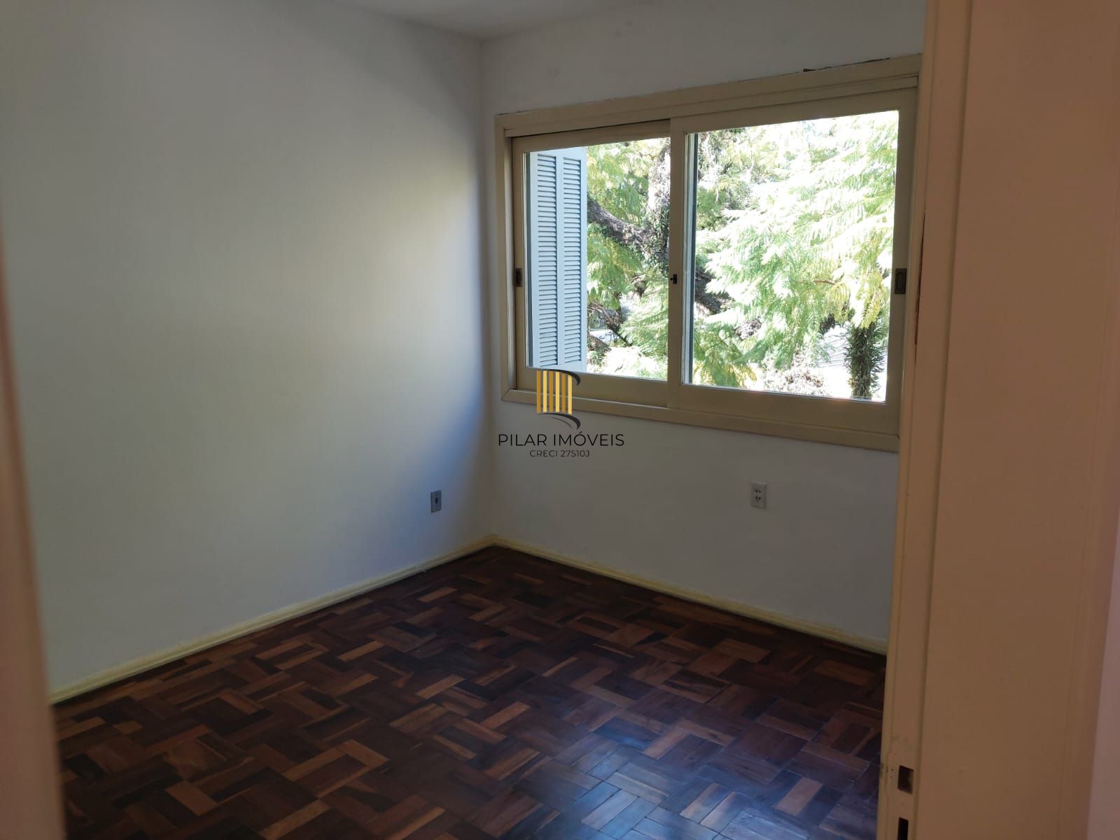 Apartamento de frente com 2 dormitórios para venda no bairro Jardim Botânico em Porto Alegre/RS. - Pilar Imóveis