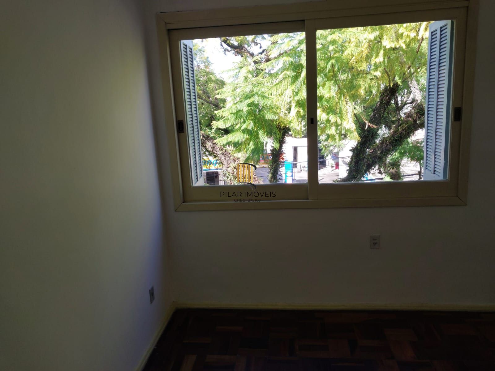 Apartamento de frente com 2 dormitórios para venda no bairro Jardim Botânico em Porto Alegre/RS.