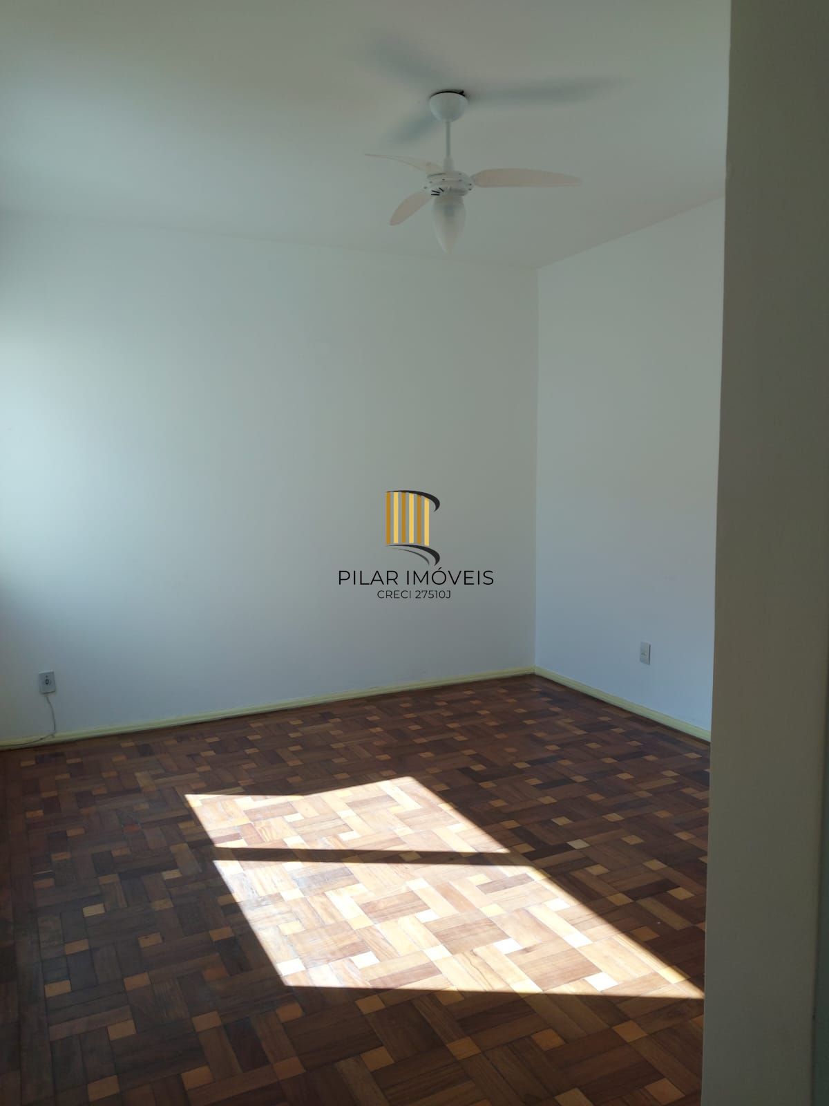 Apartamento de frente com 2 dormitórios para venda no bairro Jardim Botânico em Porto Alegre/RS.