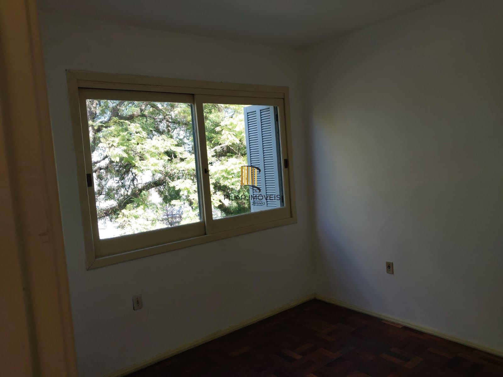 Apartamento de frente com 2 dormitórios para venda no bairro Jardim Botânico em Porto Alegre/RS.