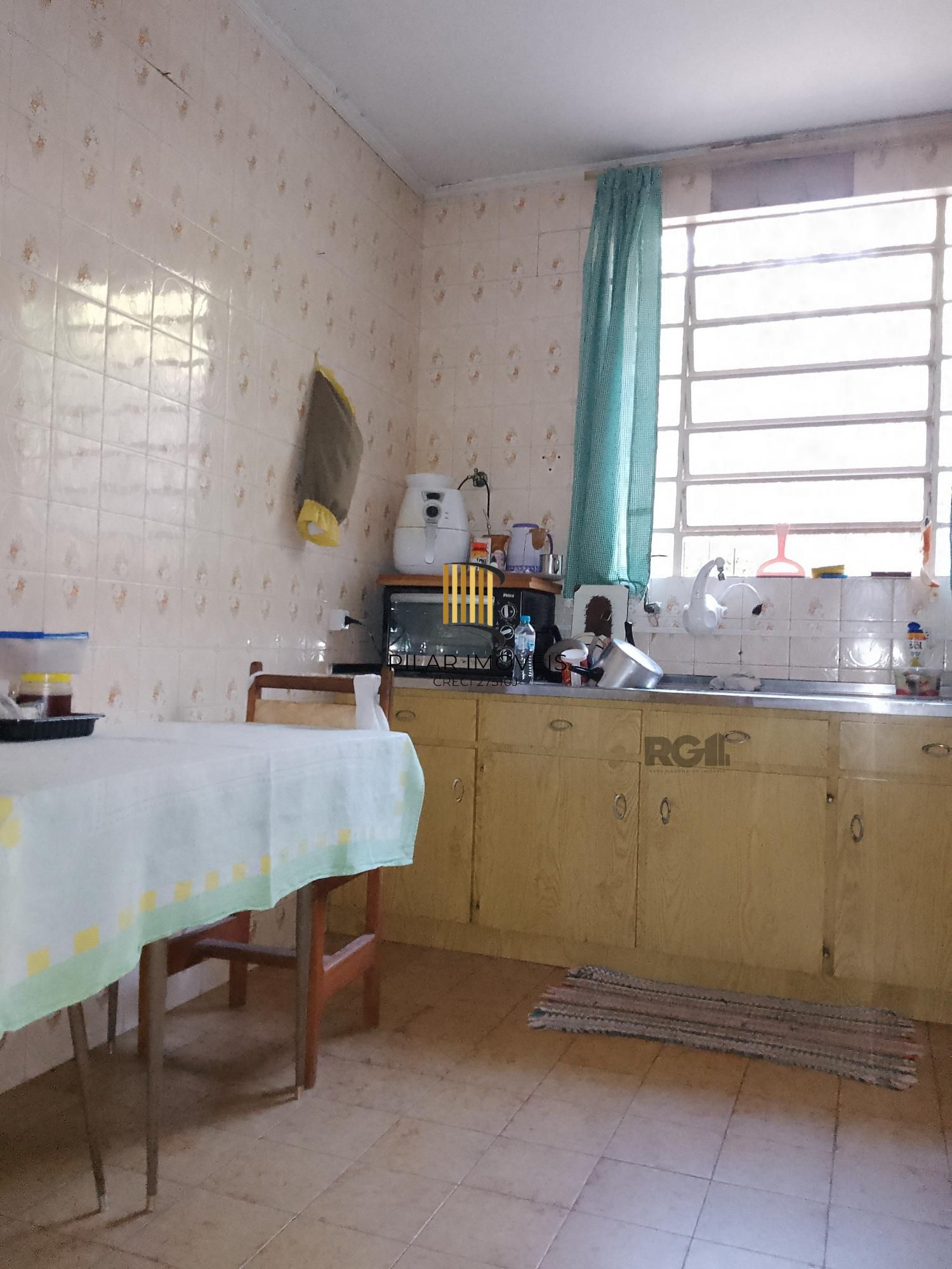 Casa 4 dormitórios, terreno com 1639m² à venda no Morro Santana