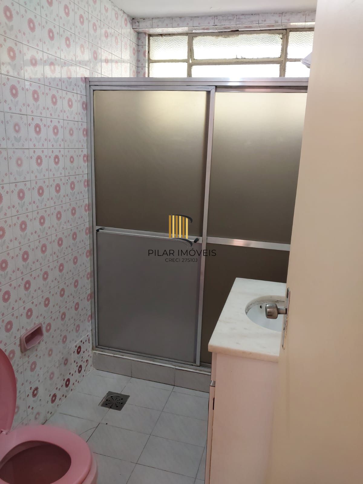 Apartamento de frente com 2 dormitórios para venda no bairro Jardim Botânico em Porto Alegre/RS.