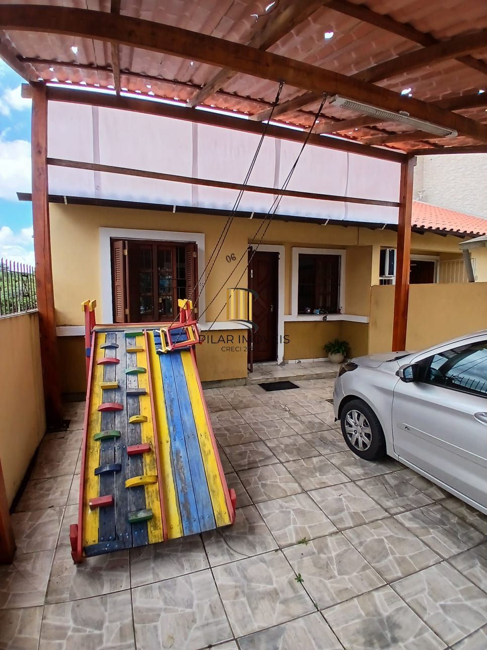 Casa de 2 dormitórios, 2 banheiros para venda no Jardim Algarve em Alvorada/RS.
