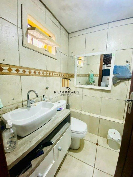 CASA BAIRRO CAMAQUÃ COM 4 DORMITORIOS