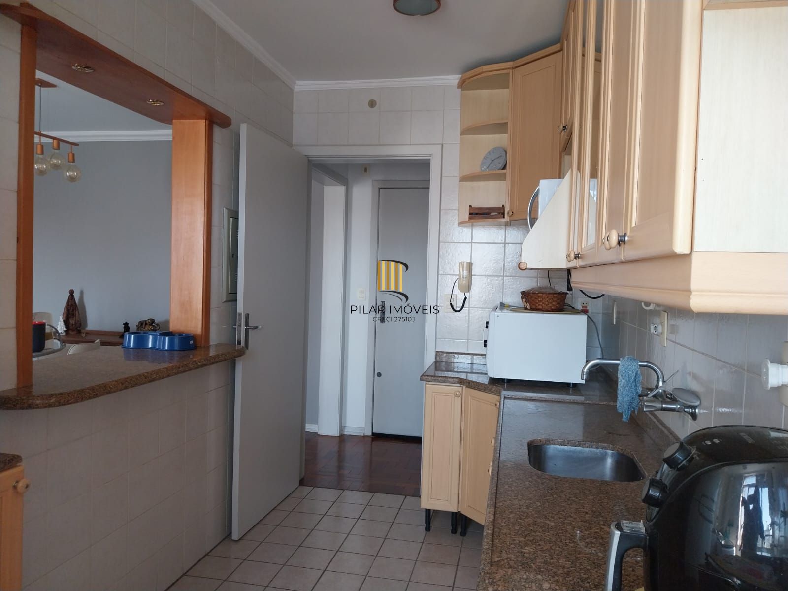 Apartamento de 2 dormitórios com vaga de garagem e sacada no Bairro Santana