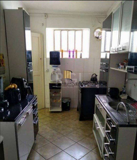 CASA EM 2 TERRENOS NO BAIRRO MEDIANEIRA