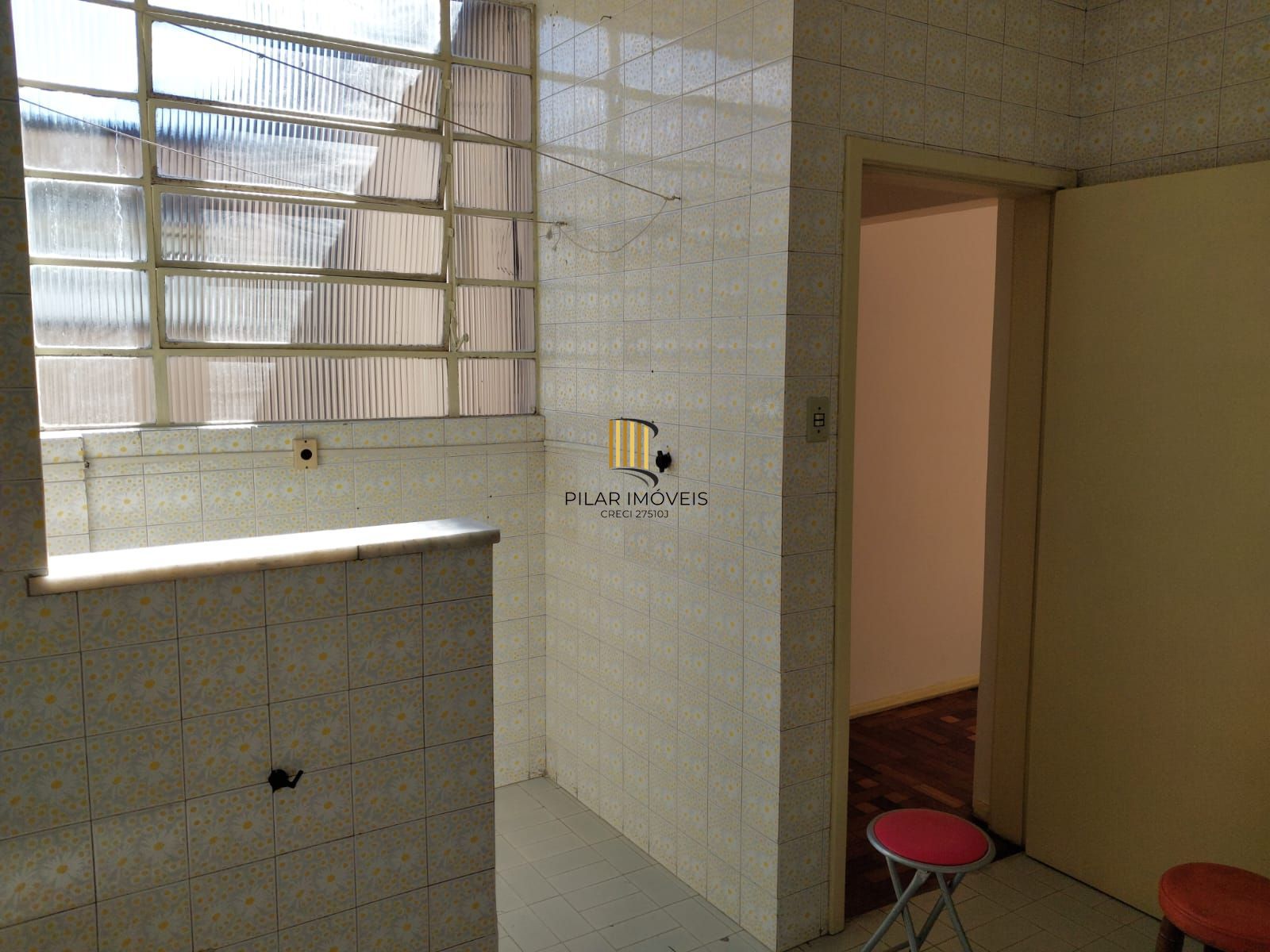 Apartamento de frente com 2 dormitórios para venda no bairro Jardim Botânico em Porto Alegre/RS.