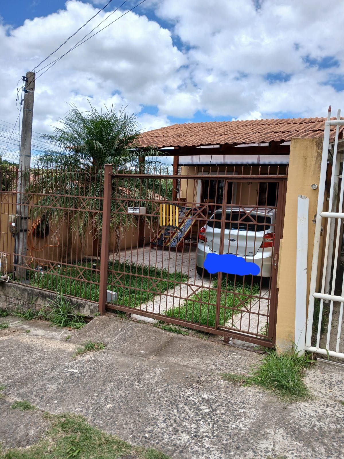 Casa de 2 dormitórios, 2 banheiros para venda no Jardim Algarve em Alvorada/RS.