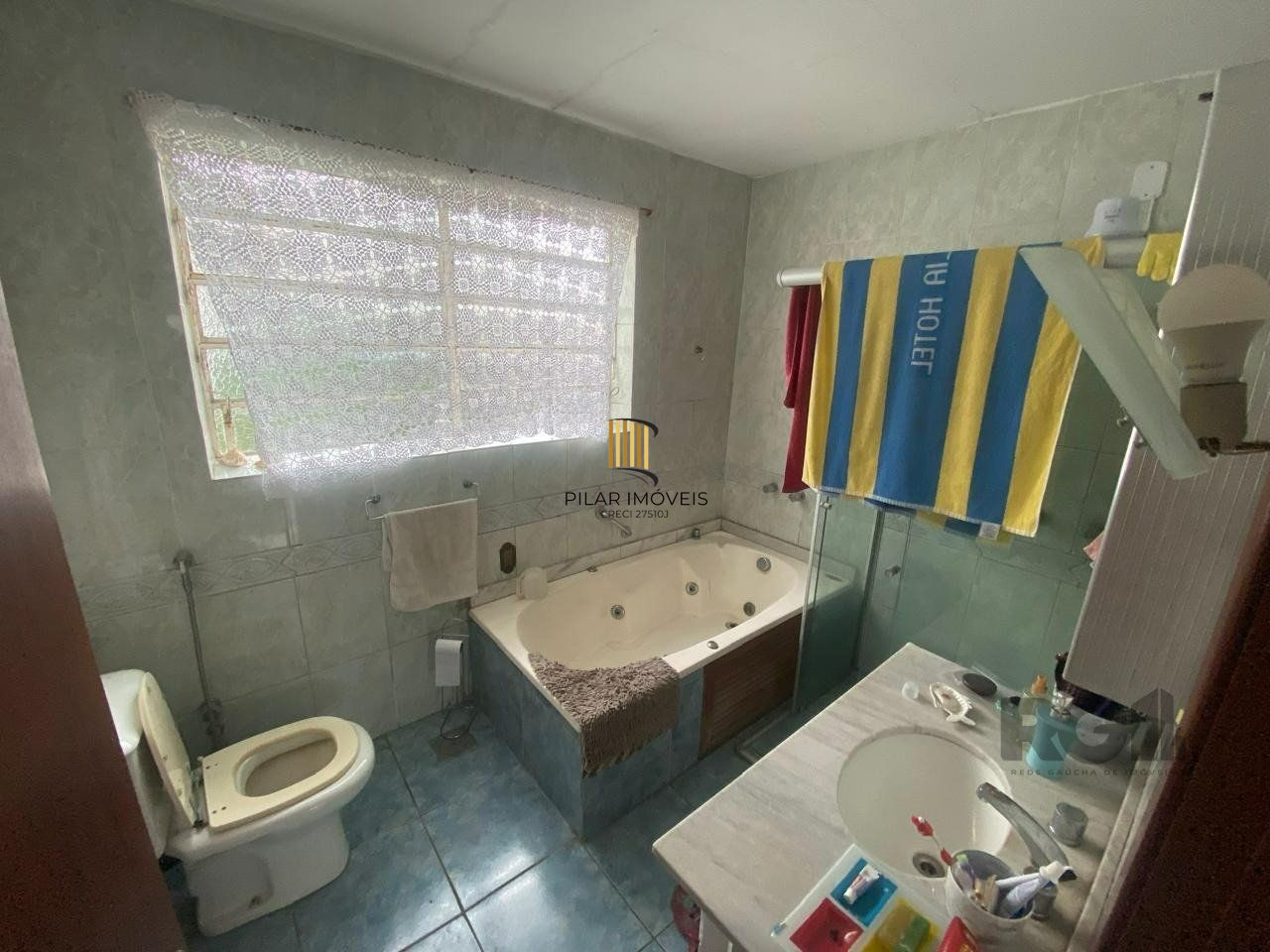 Casa 3 dormitórios no bairro Partenon