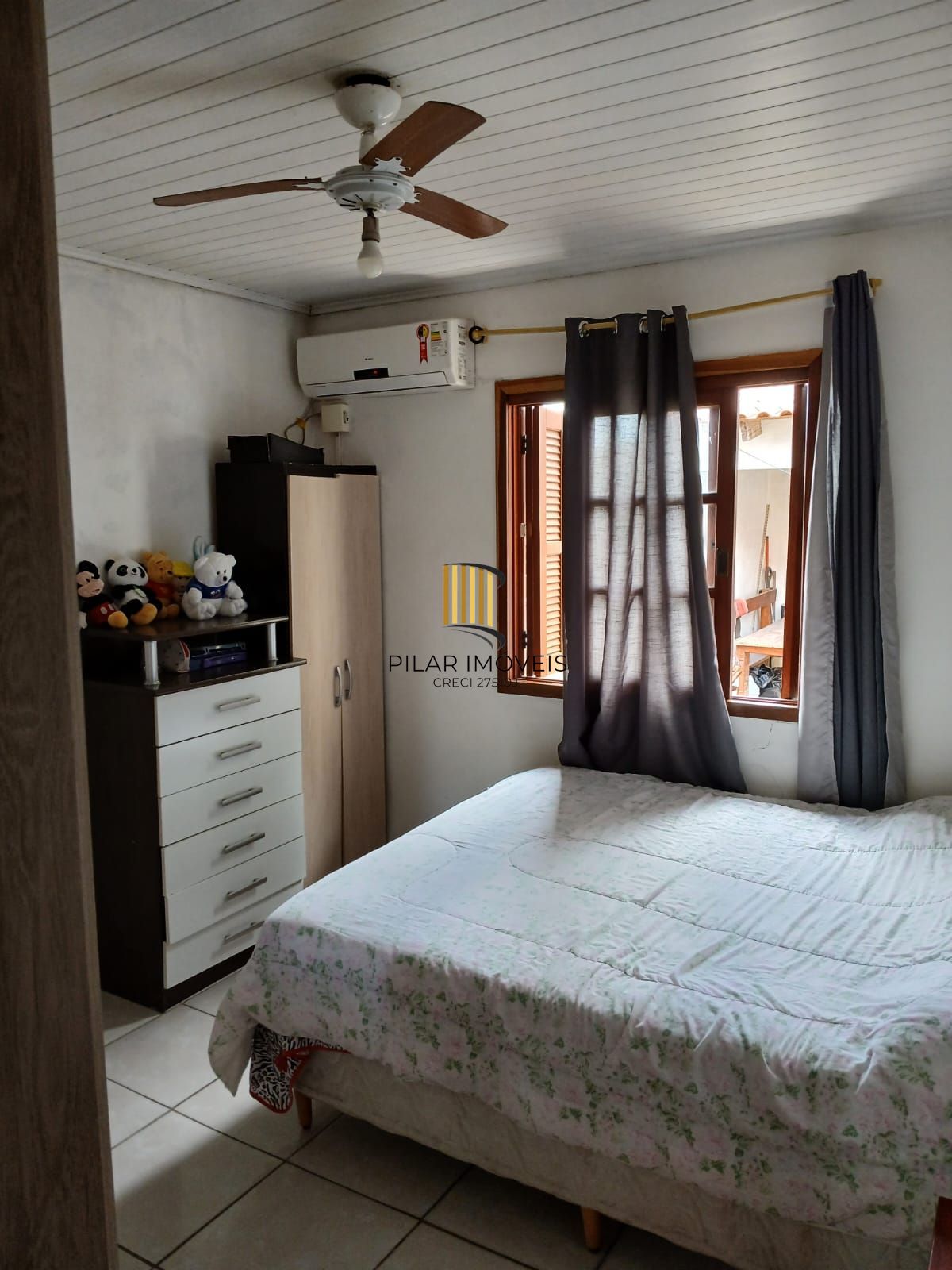 Casa de 2 dormitórios, 2 banheiros para venda no Jardim Algarve em Alvorada/RS.