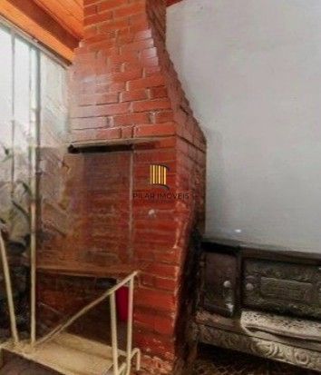 Casa 3 dormitórios no bairro Partenon