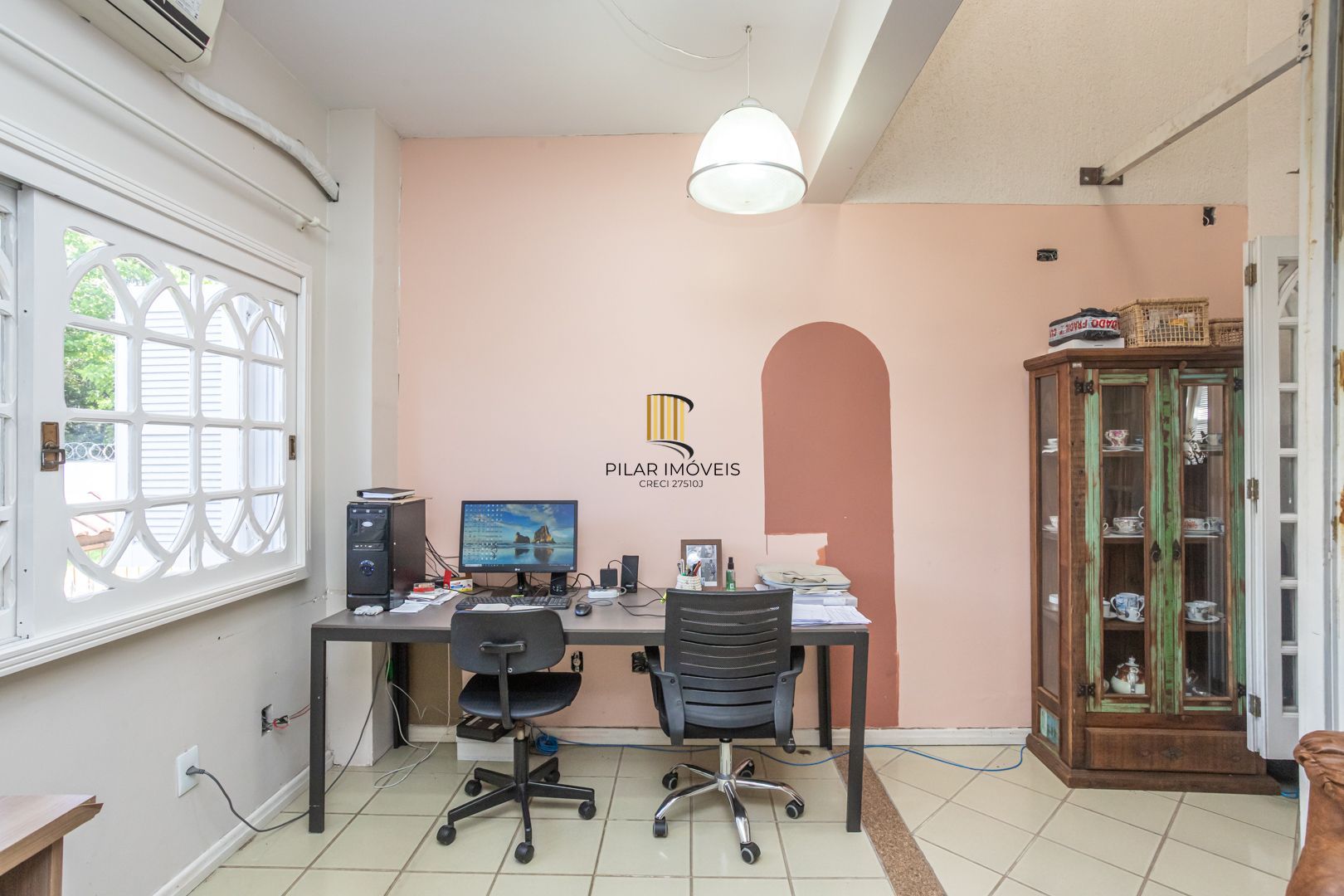 Casa 4 dormitórios no bairro Igara