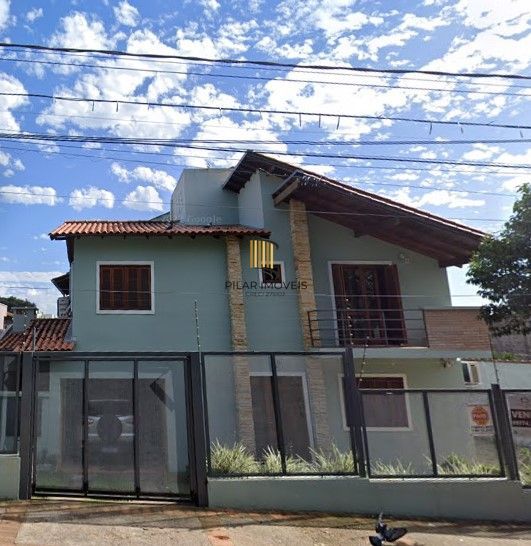 Casa de Condomínio 3 dormitórios no bairro Camaquã