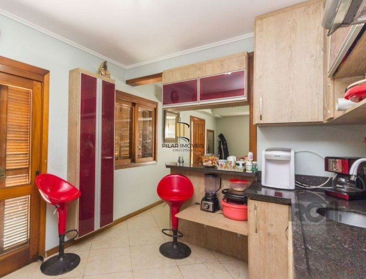Casa de Condomínio 3 dormitórios no bairro Morro Santana