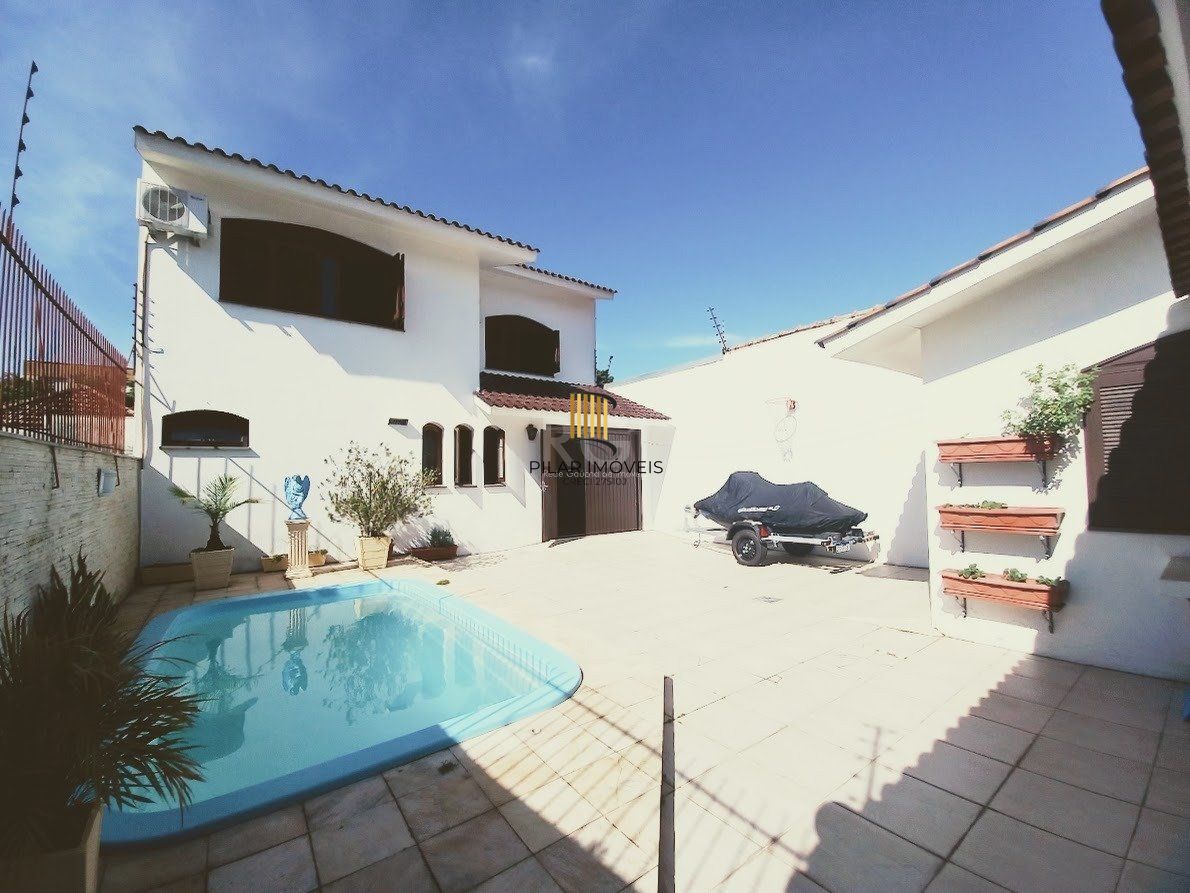 Casa 5 dormitórios no bairro Santana