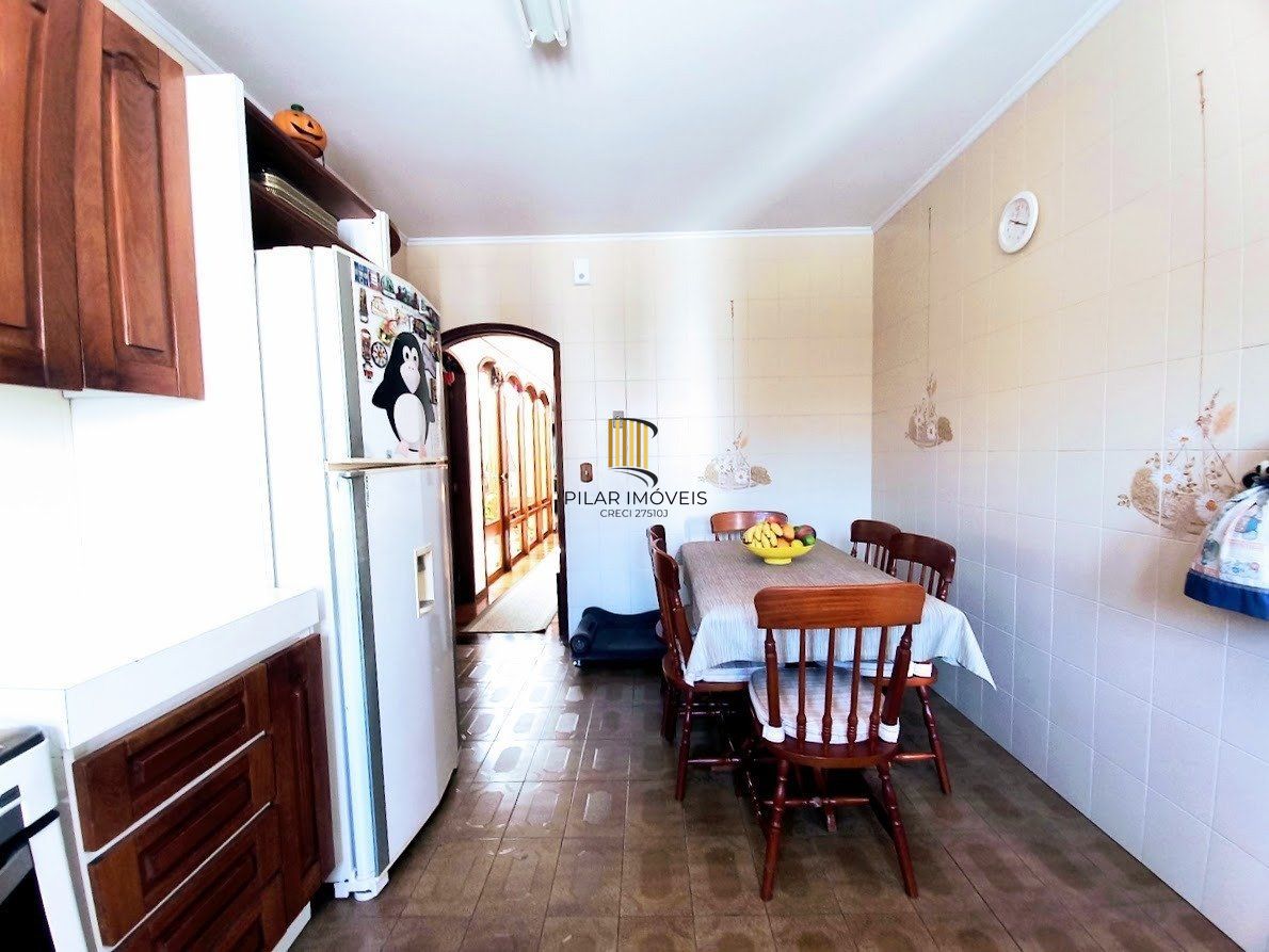 Casa 5 dormitórios no bairro Santana