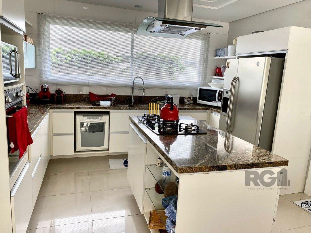 Casa de Condomínio 4 dormitórios no bairro Atlântida
