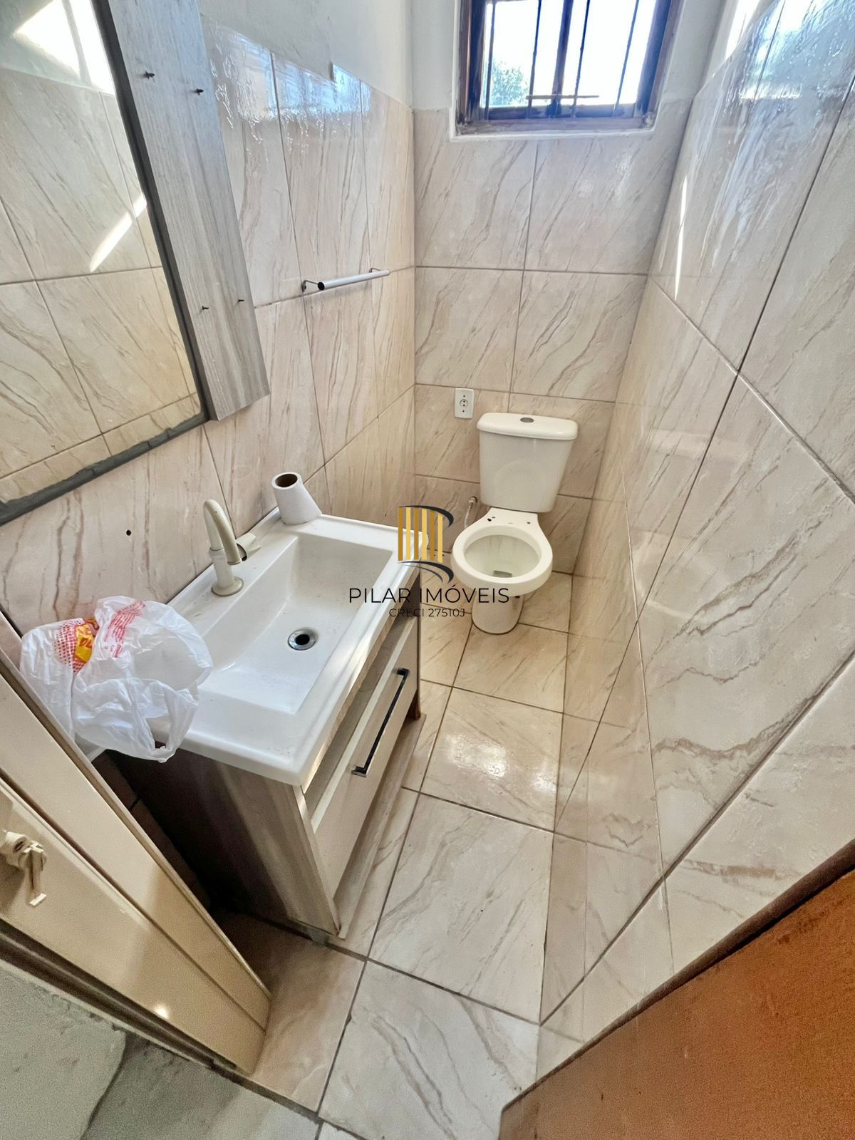 Casa de 2 dormitórios, sendo 1 suíte no Barrio Parque da Matriz, em Cachoeirinha