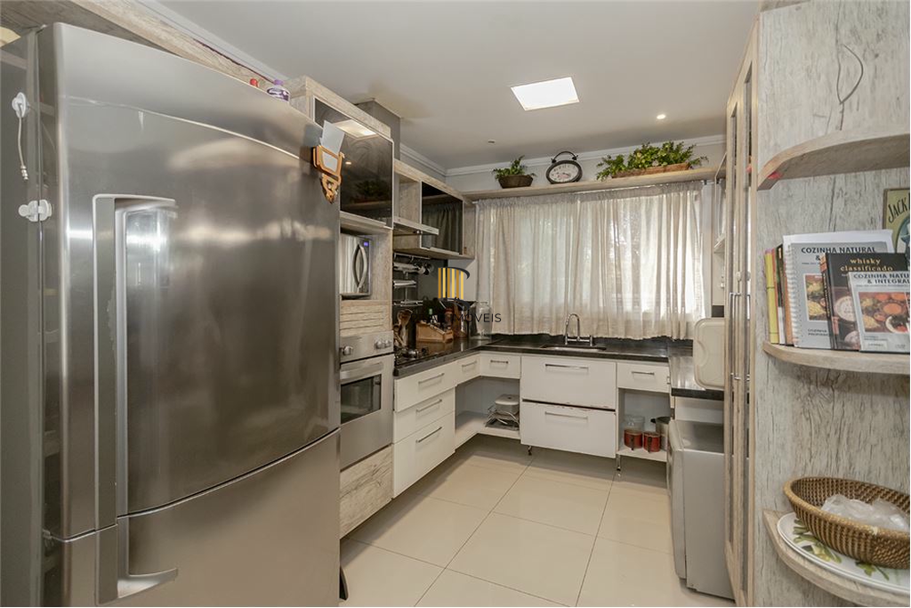 Casa 4 dormitórios no bairro Vila Assunção