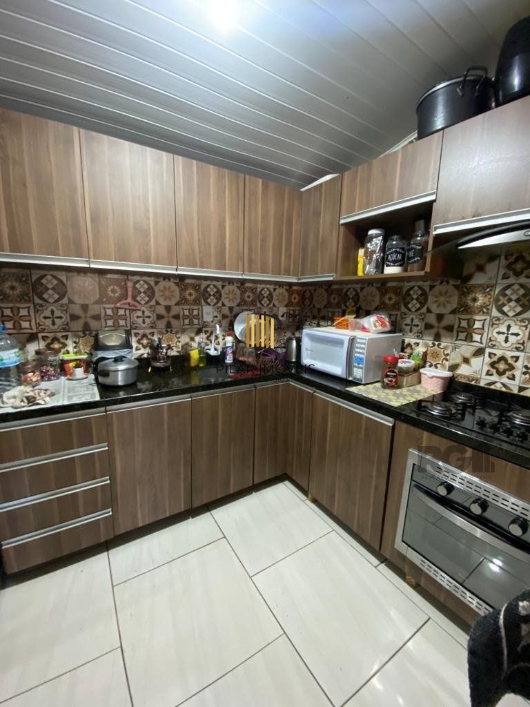 Casa 2 dormitórios, vaga de garagem, Bairro Pq dos Eucalípitos