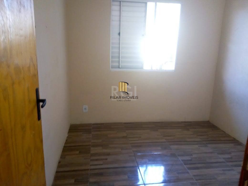 Casa 2 dormitórios, 1 vaga de garagem, Bairro Marechal Rondon