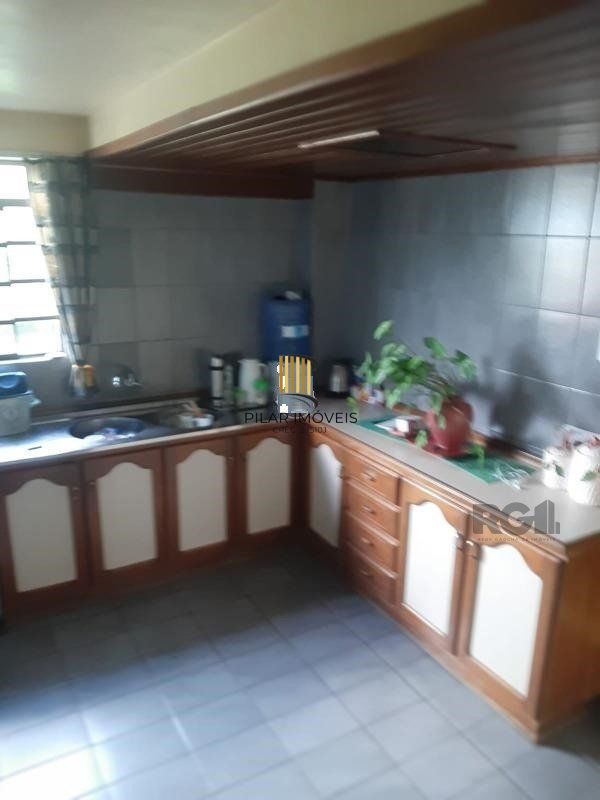 Casa 4 dormitórios, 1 suíte, vagas de garagem, Bairro Bom Princípio