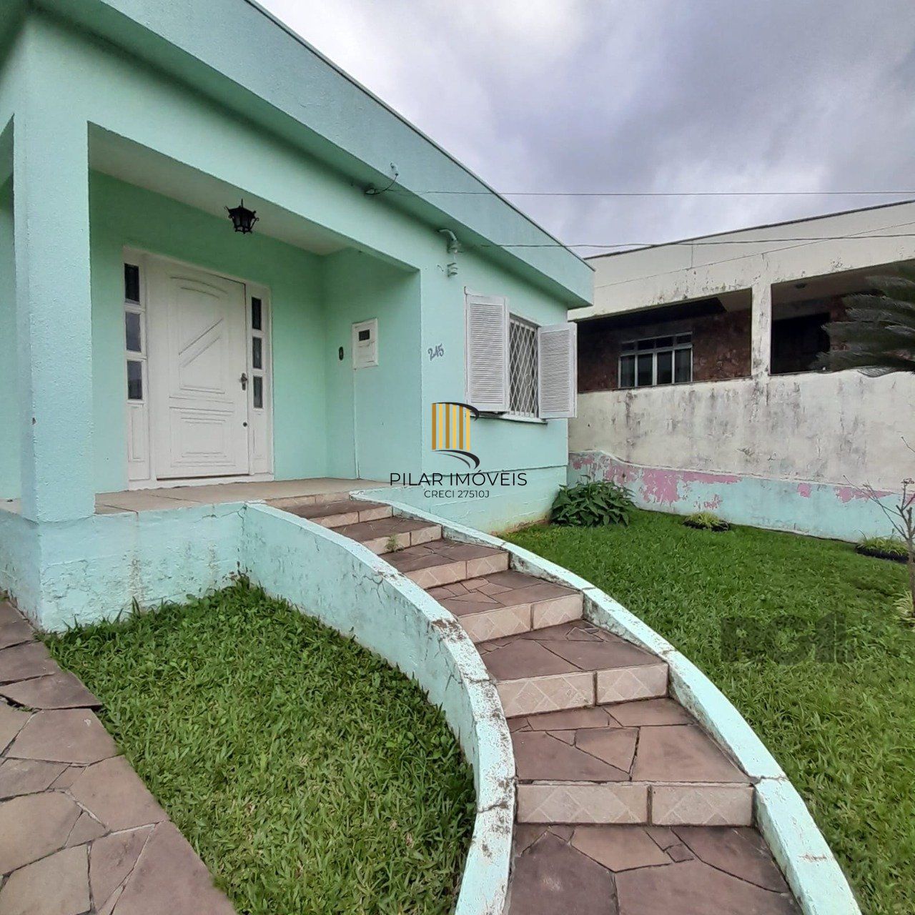 Casa 2 dormitórios, vaga de garagem, bairro São Judas Tadeu