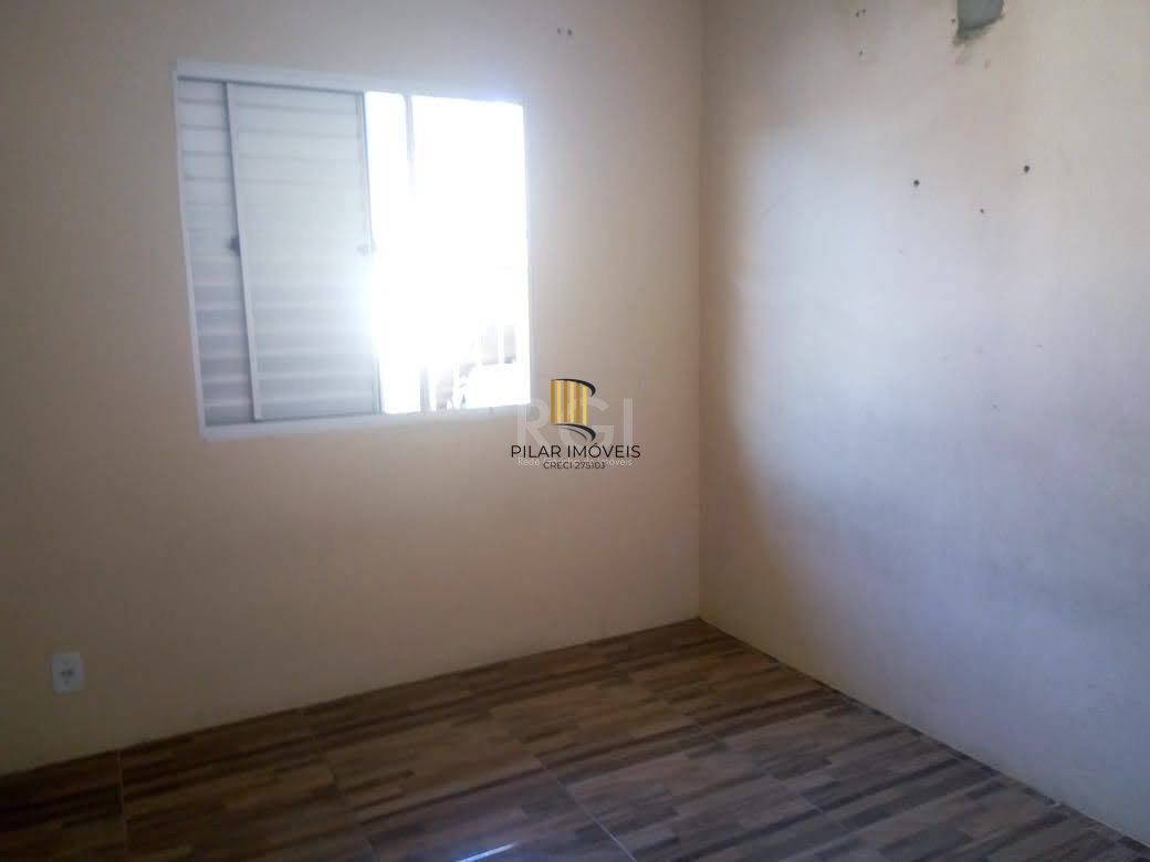 Casa 2 dormitórios, 1 vaga de garagem, Bairro Marechal Rondon