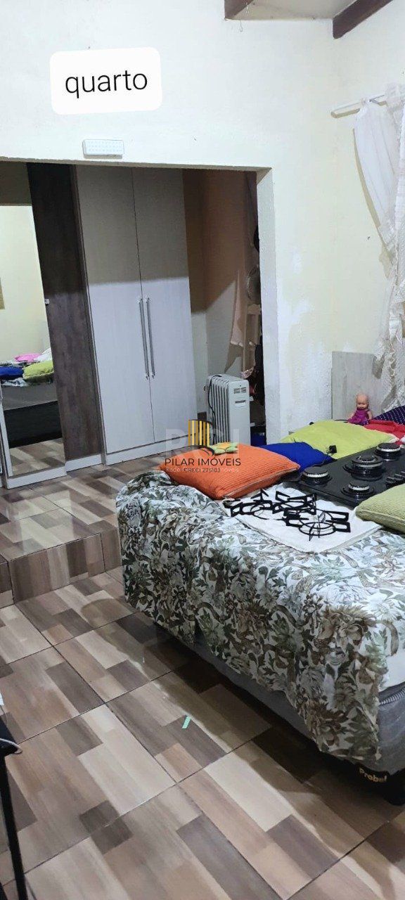 Casa 2 dormitórios, 1 suíte, vaga de garagem, Bairro Nova Cachoeirinha