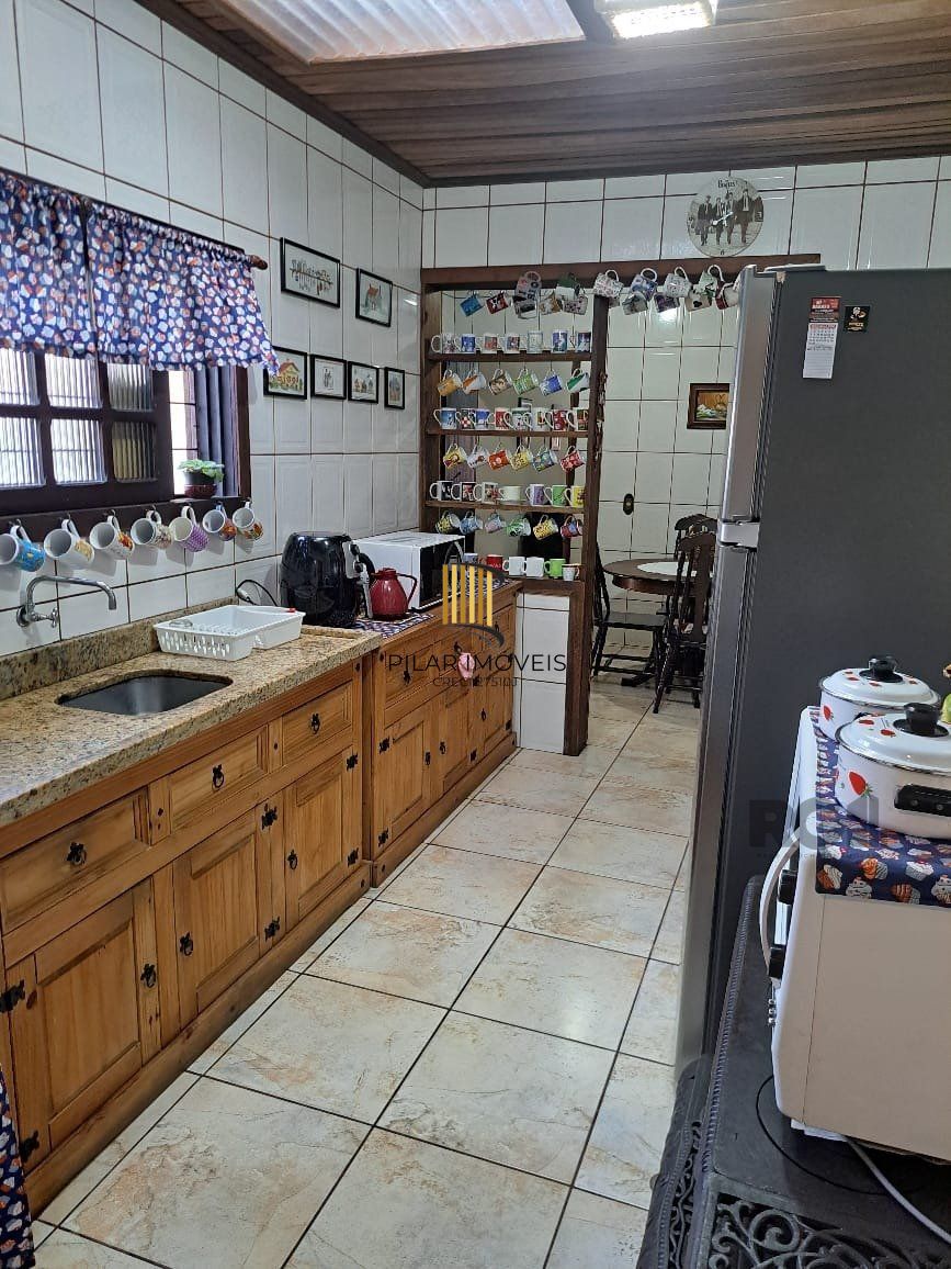 Casa 3 dormitórios, 1 suíte, vagas de garagem, Bairro Vila Marcia