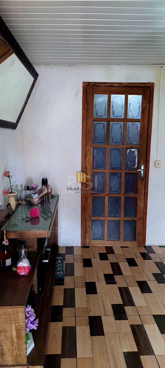 Casa 2 dormitórios, 1 suíte, vaga de garagem, Bairro Nova Cachoeirinha
