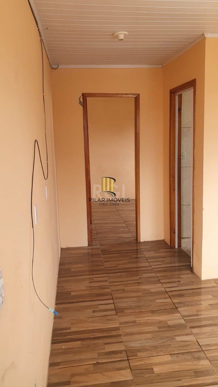 Casa 2 dormitórios, 1 vaga de garagem, Bairro Marechal Rondon