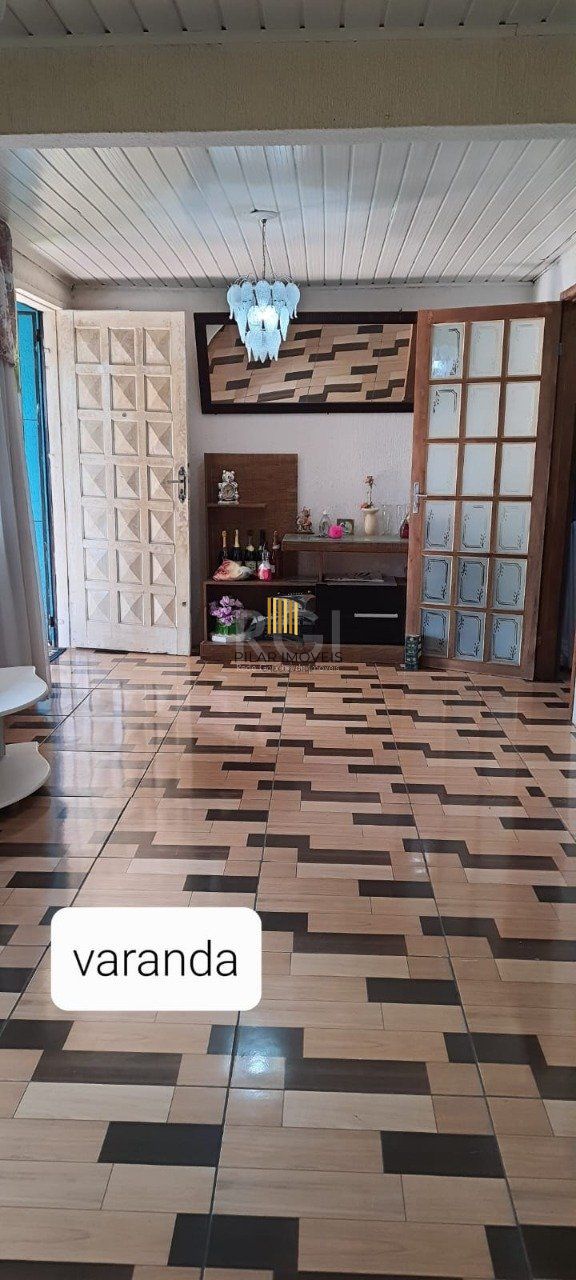 Casa 2 dormitórios, 1 suíte, vaga de garagem, Bairro Nova Cachoeirinha