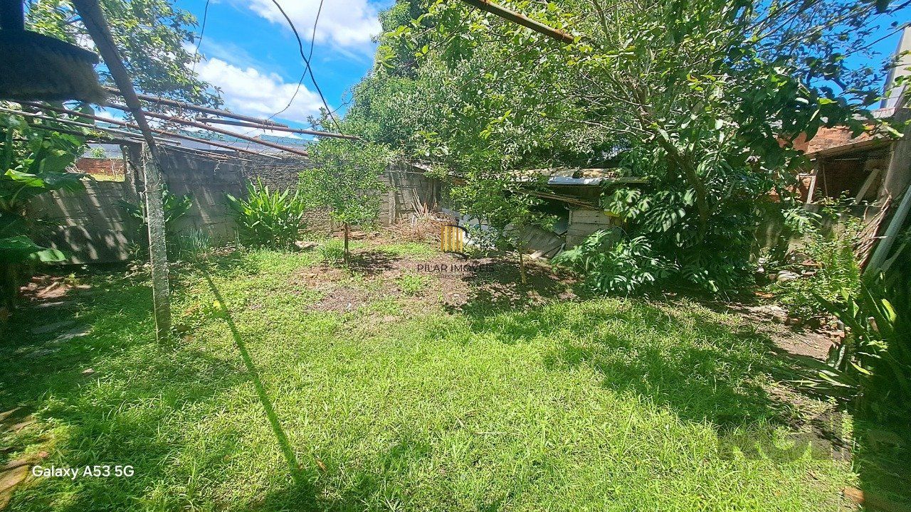 Casa 3 dormitórios, 1 suíte, vagas de garagem, Bairro Vila Cachoeirinha