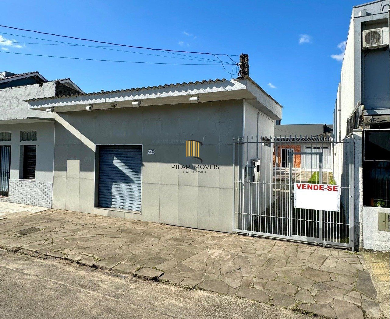 Loja no bairro Vila Monte Carlo - Pilar Imóveis