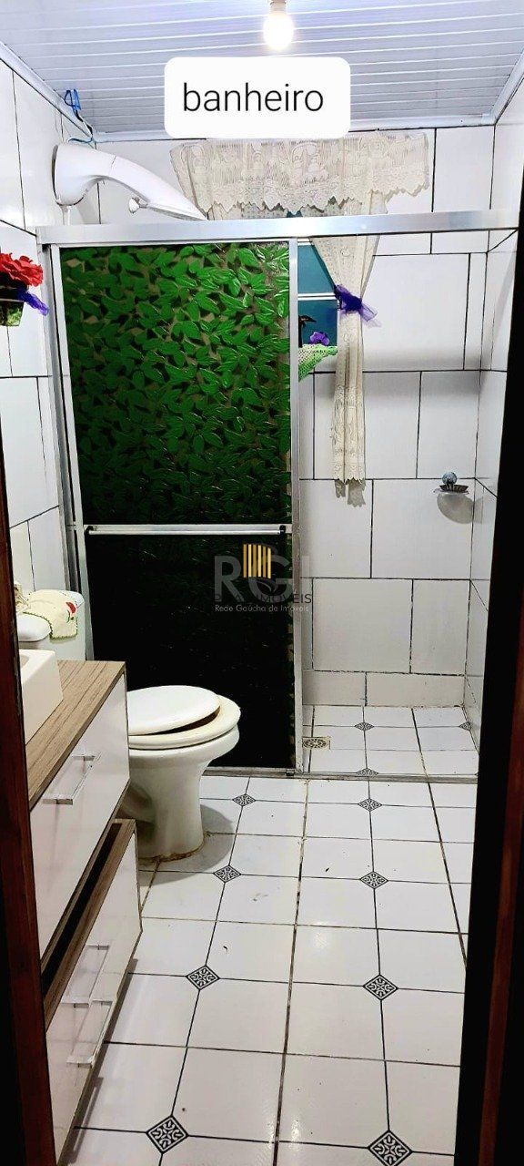 Casa 2 dormitórios, 1 suíte, vaga de garagem, Bairro Nova Cachoeirinha