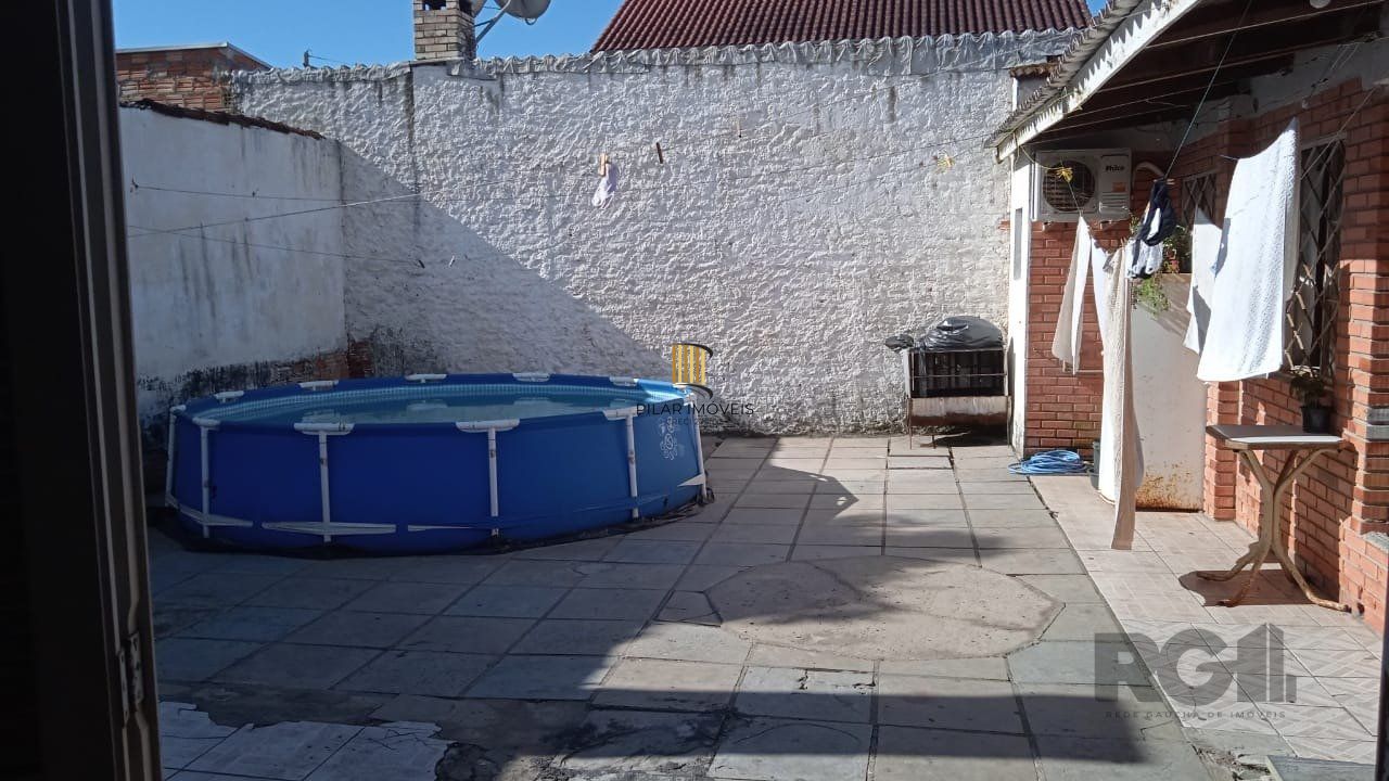 Casa 3 dormitórios, vagas de garagem, Bairro Vila Cachoeirinha