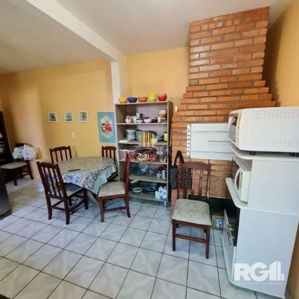 Casa 4 dormitórios no bairro Partenon