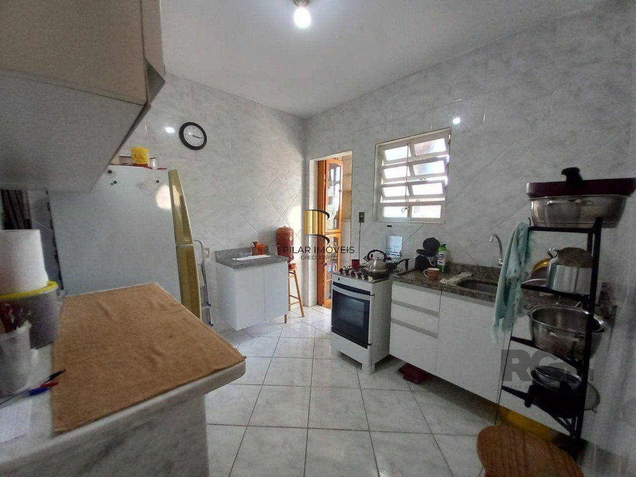 Apartamento 3 dormitórios com casa nos fundos