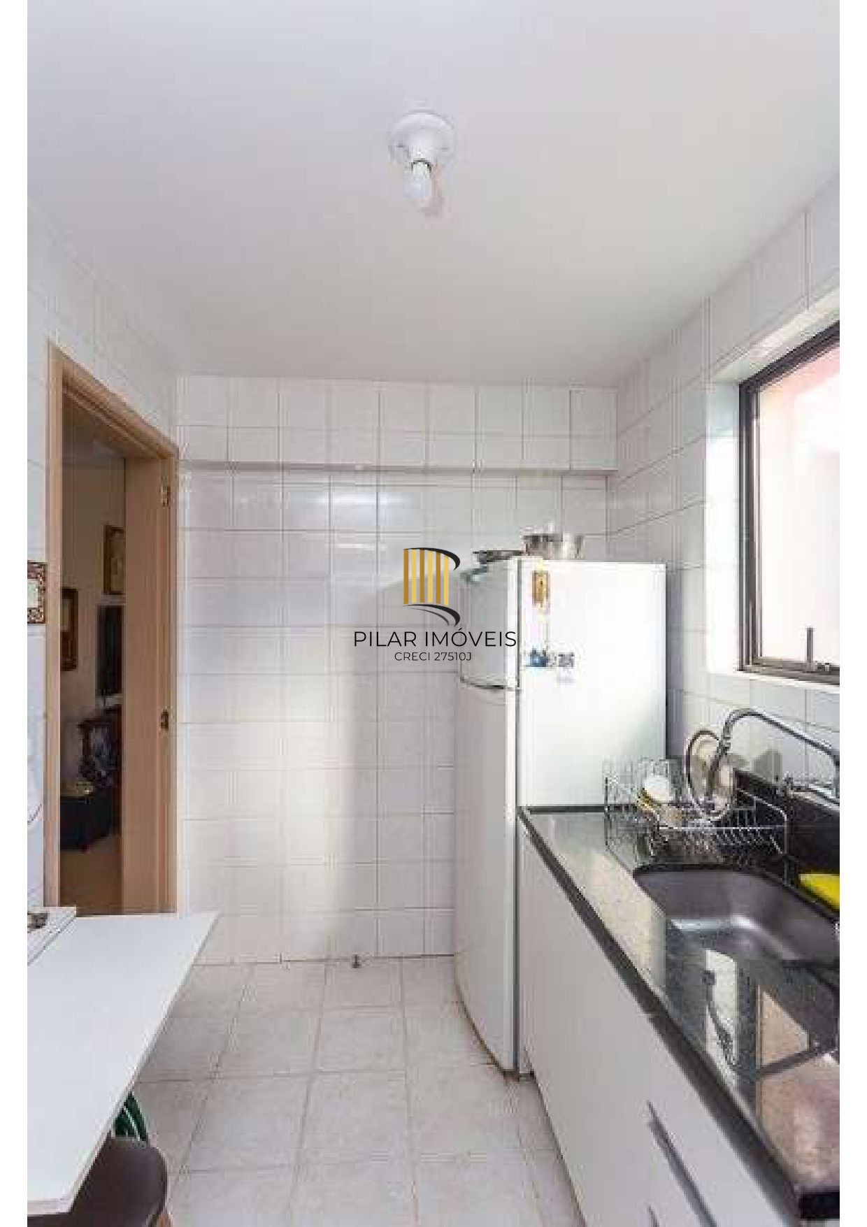 APARTAMENTO 2 DORMITÓRIOS, 2 SACADAS, GARAGEM. BAIRRO INDEPENDÊNCIA