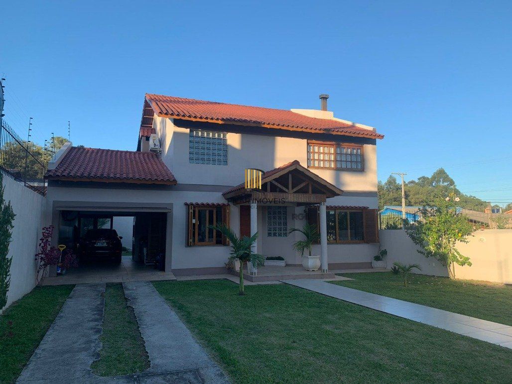 Casa com 3 dormitórios ( todos sendo suíte) por R$ 1.100.000,00 na Rua Luis Alberto Serralta nº 268 - Jardins - Santana do Livramento-RS