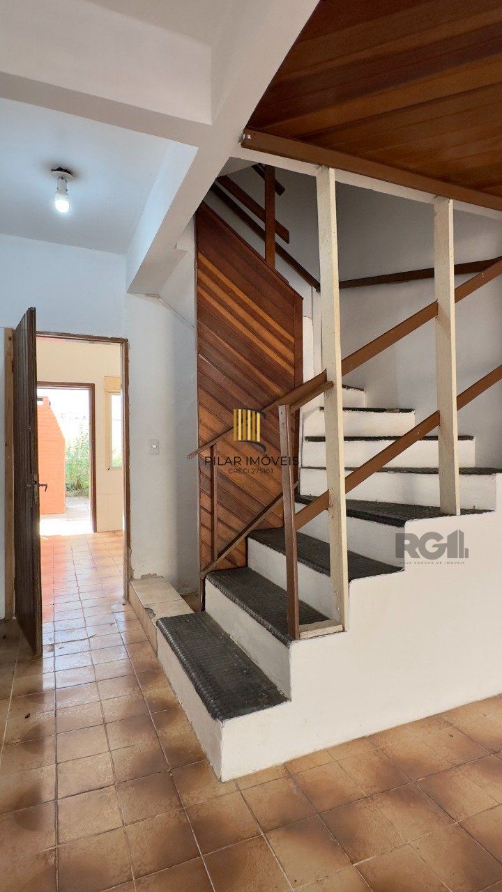 CASA COM 4 DORMITÓRIOS E PÁTIO COM CHURRASQUEIRA NO CENTRO HISTÓRICO