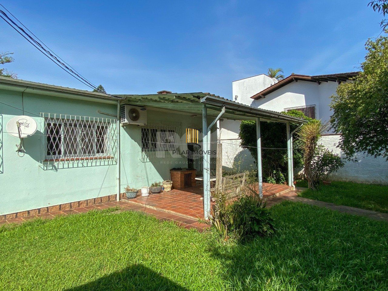 Casa com 4 dormitórios, no bairro Nossa Senhora das Graças em Canoas/RS