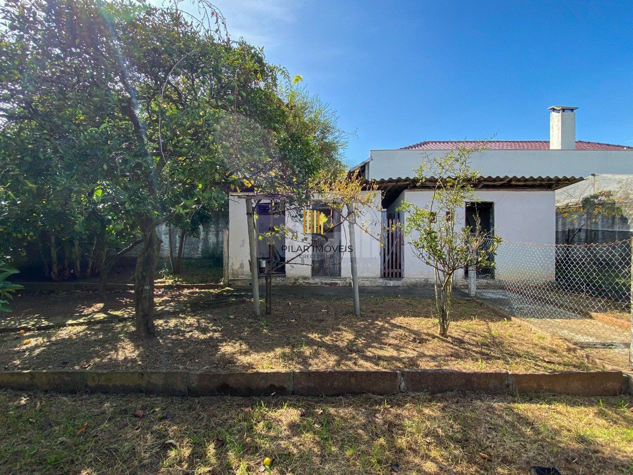 Casa com 4 dormitórios, no bairro Nossa Senhora das Graças em Canoas/RS