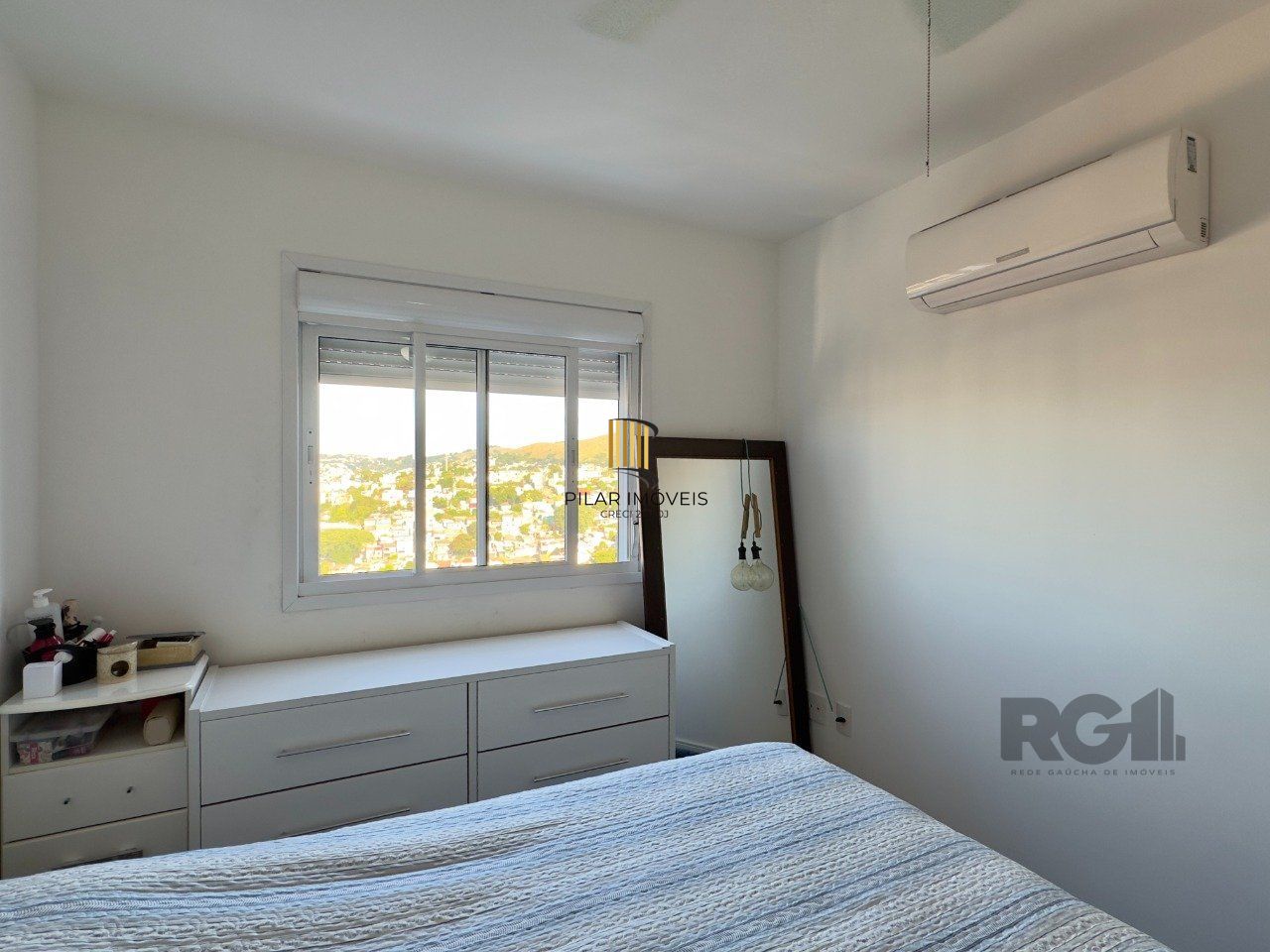 APARTAMENTO 2 DORMITÓRIOS COM SUÍTE E VAGA DE GARAGEM PRÓXIMO À PUCRS