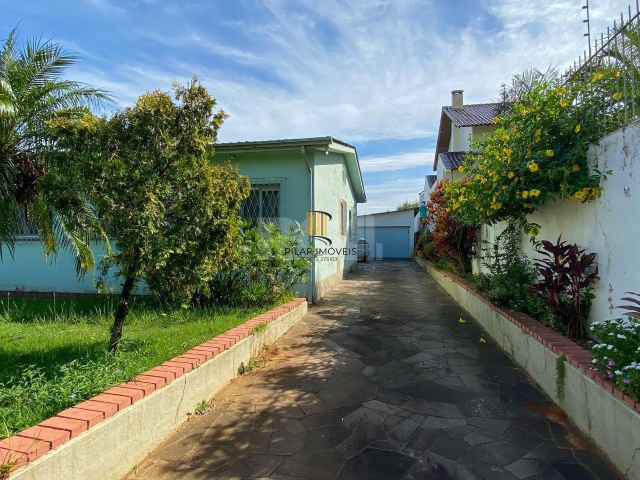 Casa com 4 dormitórios, no bairro Nossa Senhora das Graças em Canoas/RS