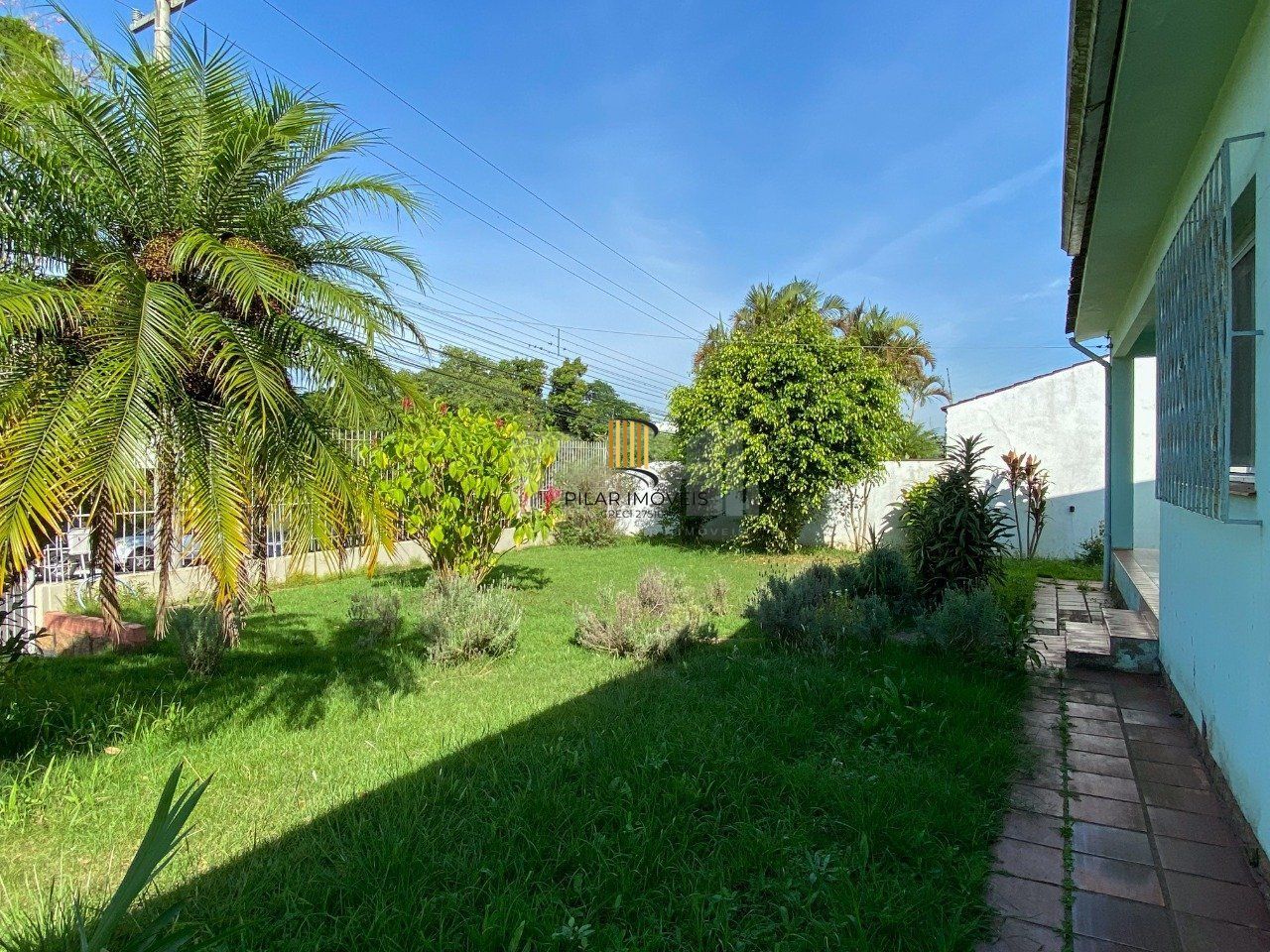 Casa com 4 dormitórios, no bairro Nossa Senhora das Graças em Canoas/RS