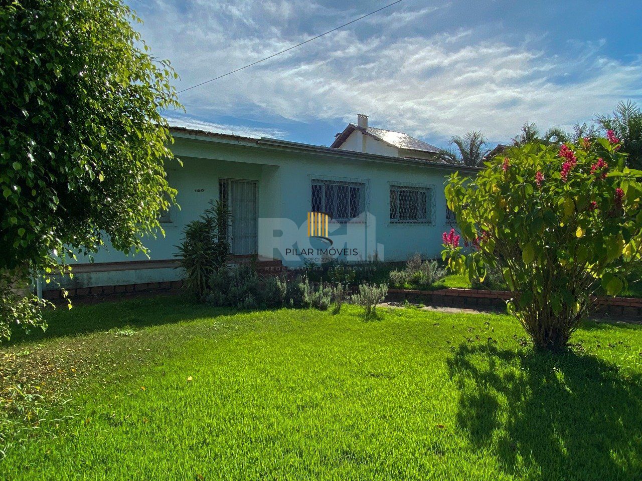 Casa com 4 dormitórios, no bairro Nossa Senhora das Graças em Canoas/RS